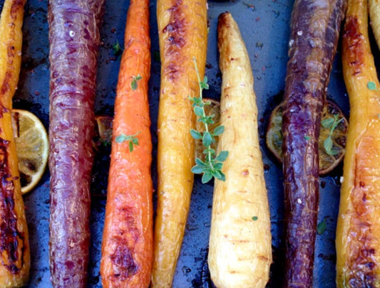 Roasted Heirloom Carrots with Pistachio Hummus, Garlic Dill Yogurt, Harissa Vinaigrette