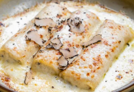 Black truffle house-made cannelloni, whipped Ricotta, bechamel